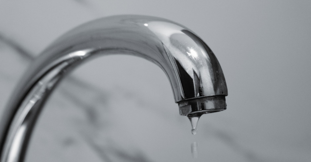 How to Find a Hidden Water Leak in Your Home Before It Causes Serious Damage Plumber checking for a hidden water leak inside a home