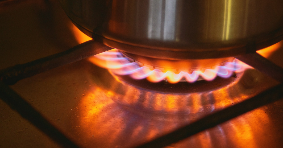 Suspect a Gas Leak at Home_ Do This Immediately and Call a Licensed Gas Fitter Licensed gas fitter inspecting gas pipes for a possible leak