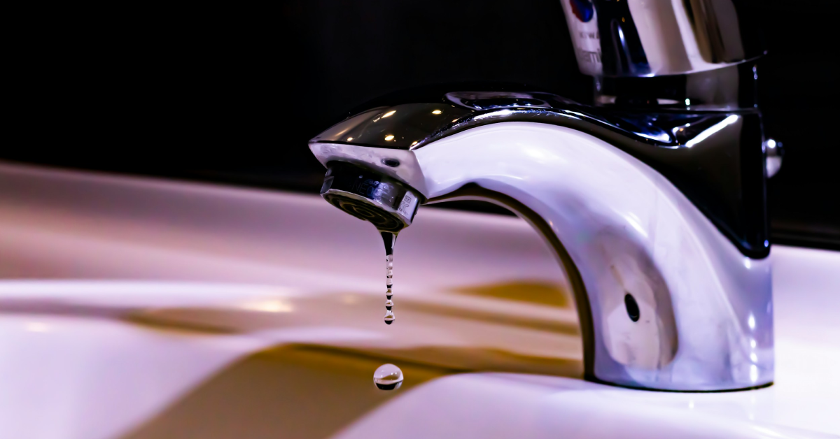 Why Is My Water Pressure So Low_ Common Causes and Fixes for Western Suburbs Homes Plumber checking water pressure in a residential property